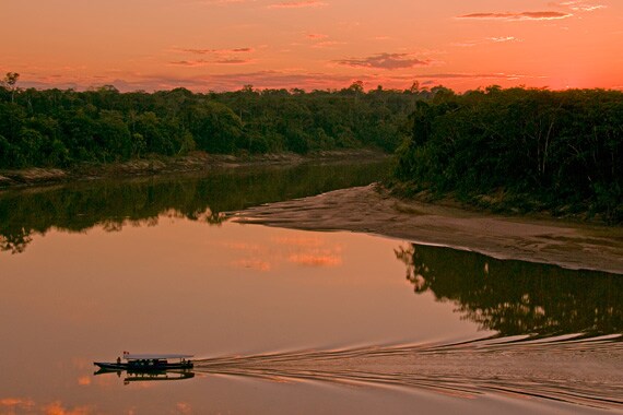 Travel by river to access these remote lodges nestled in pristine forests.