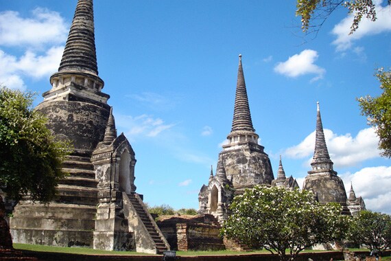 Ayutthaya, an ancient capital city founded in 1350, is famous for its spectacular temple ruins. We climb up the steep steps of the main temple for amazing views.
