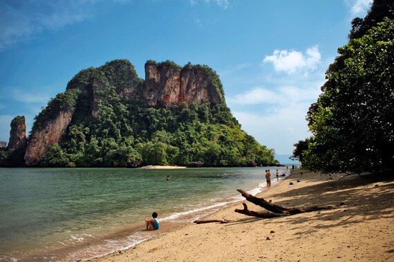We travel by longtail boat to the Krabi side of Phang Nga Bay where we'll kayak and beachcomb. All too soon it's time to head back for our final night in a Phuket beachside resort.