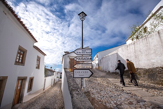 Walking around small villages, travelers get a sense of local life.