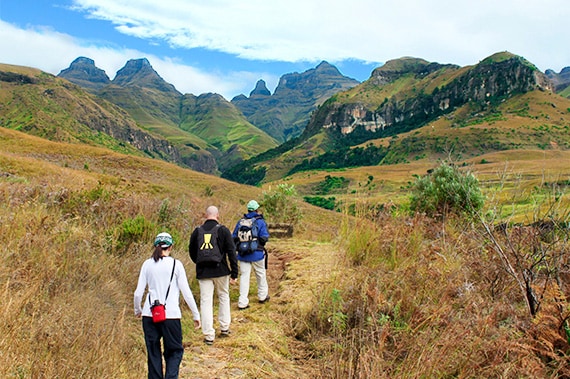 Hiking in the Cathedral Peak region of the Drakensberg Mountains.