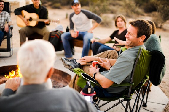 Relax and share stories around the evening campfire with new friends.