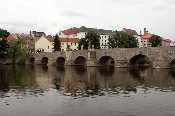In Pisek, we stop to snap photos of its seven-arched, gothic stone bridge, the oldest in central Europe.