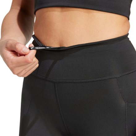 Own The Run 7/8 Tights - Women's