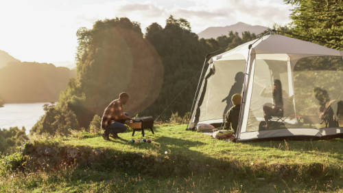 campers setting up a tent