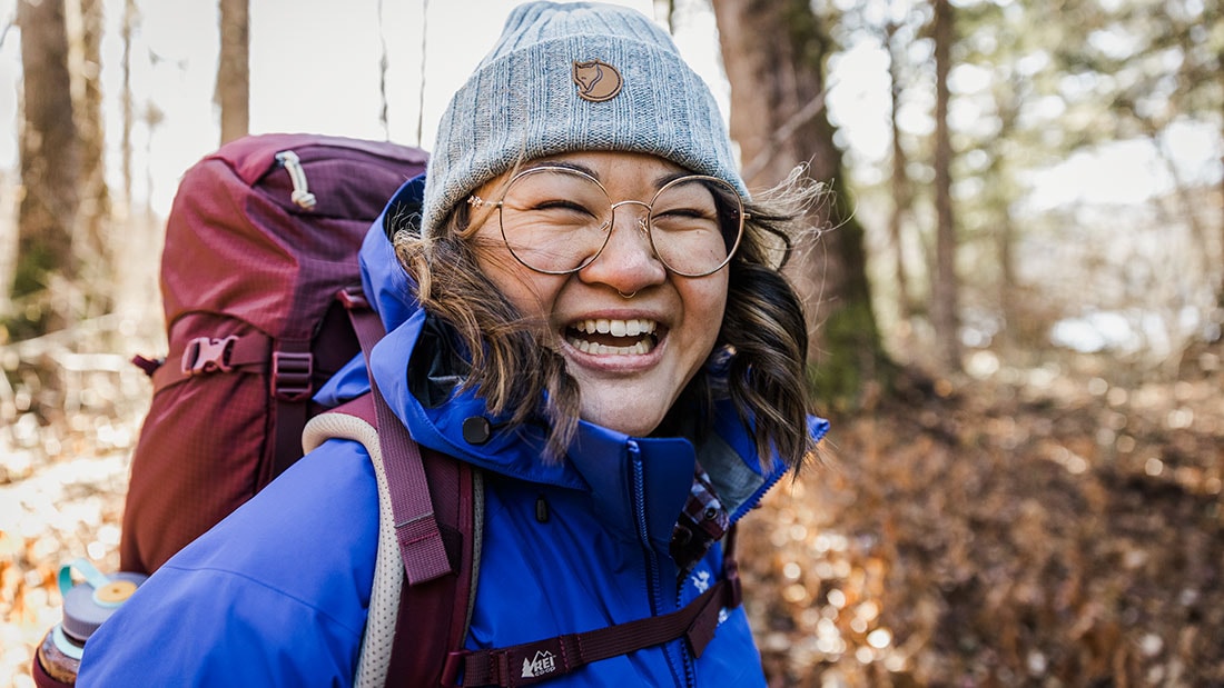 A hiker smiling.