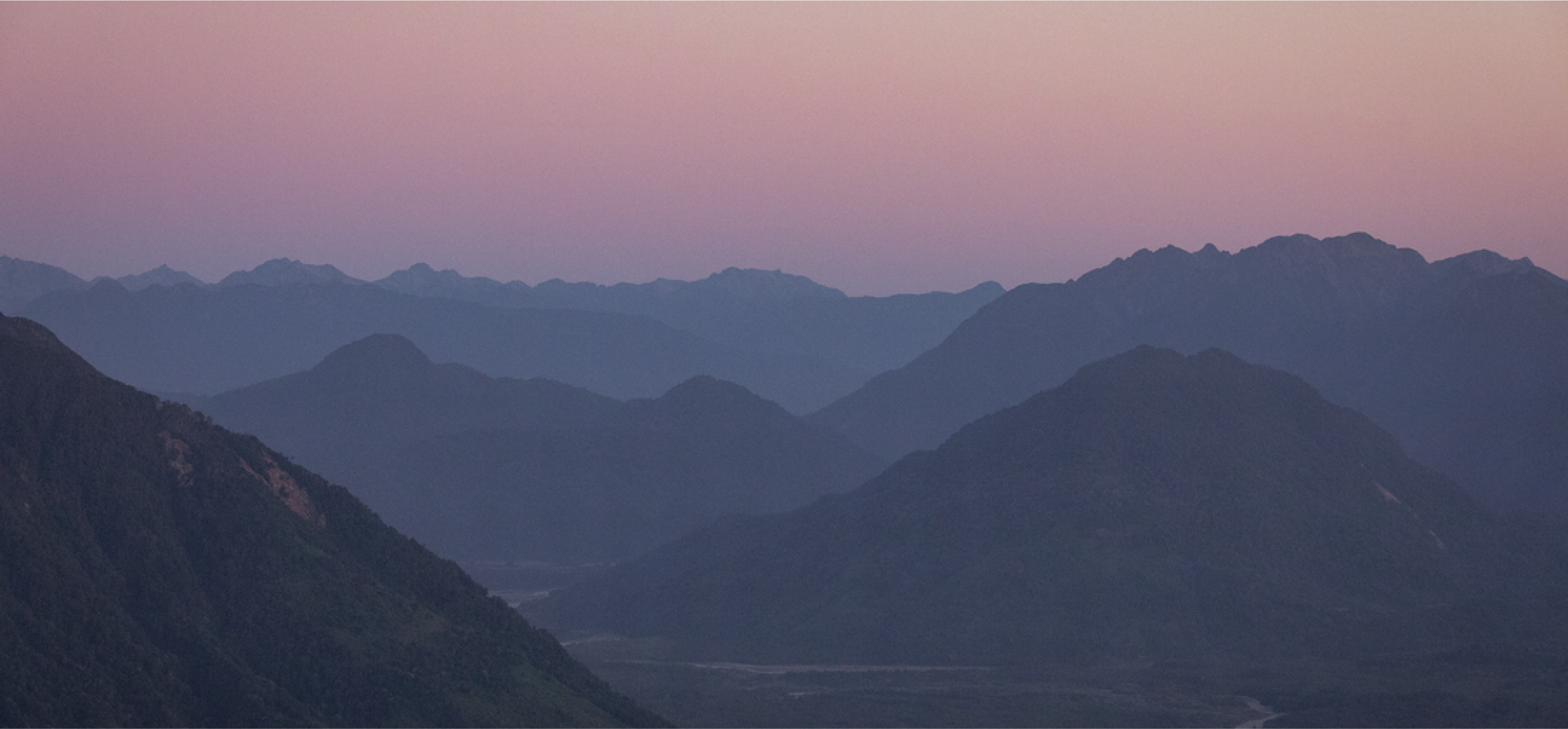 A sprawling mountain landscape.