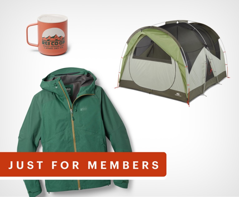 An R E I Co-op brand coffee mug, tent and jacket. Text reads, just for members.