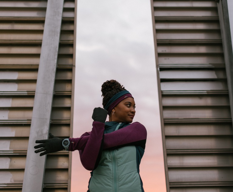 A runner warms up on a cool morning