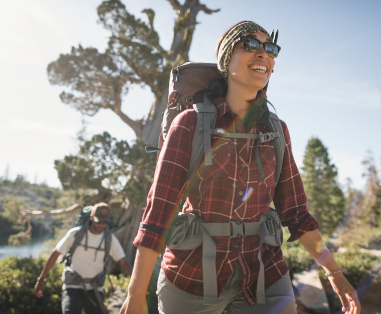 A group of hikers enjoy a sunny day