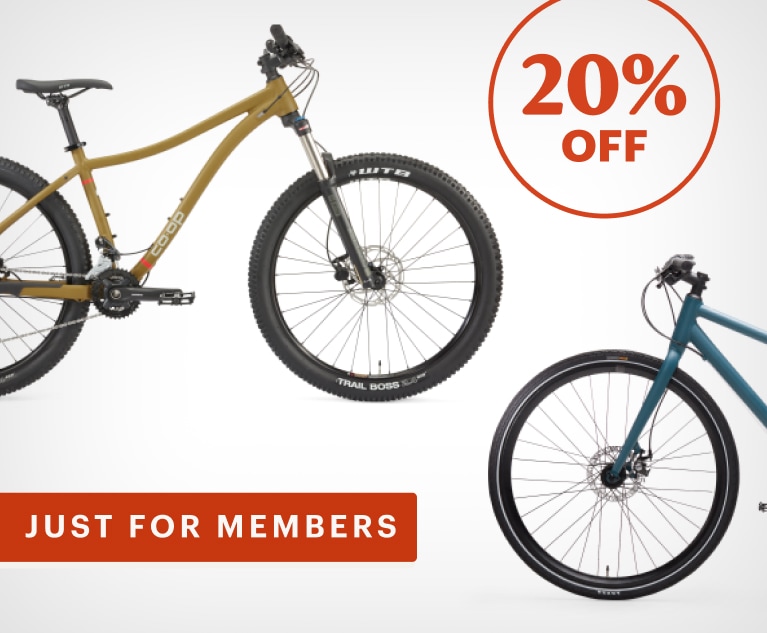 Two Co-op Cycles bikes in olive green and blue