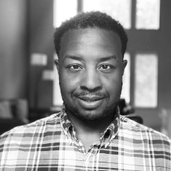 A smiling portrait of Muhammad Umar, R E I Co-op's Divisional Vice President of Diversity & Talent