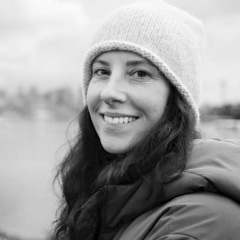 A smiling portrait of Isabelle Portilla, R E I Co-op's Divisional Vice President, Product Strategy & Design