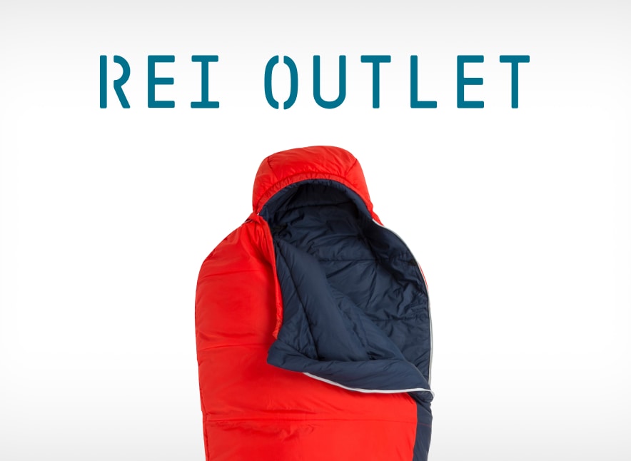 A blue and red mummy sleeping bag. Text reads, "R E I Outlet."