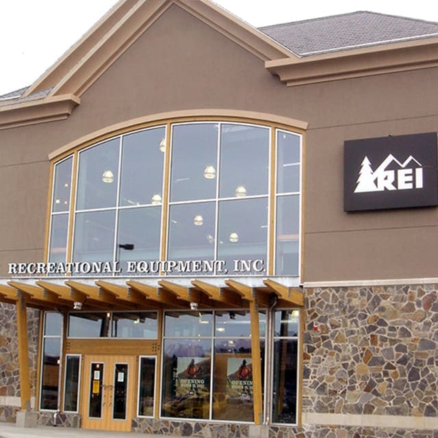 Workers boarding up the REI Flagship store in New York during the