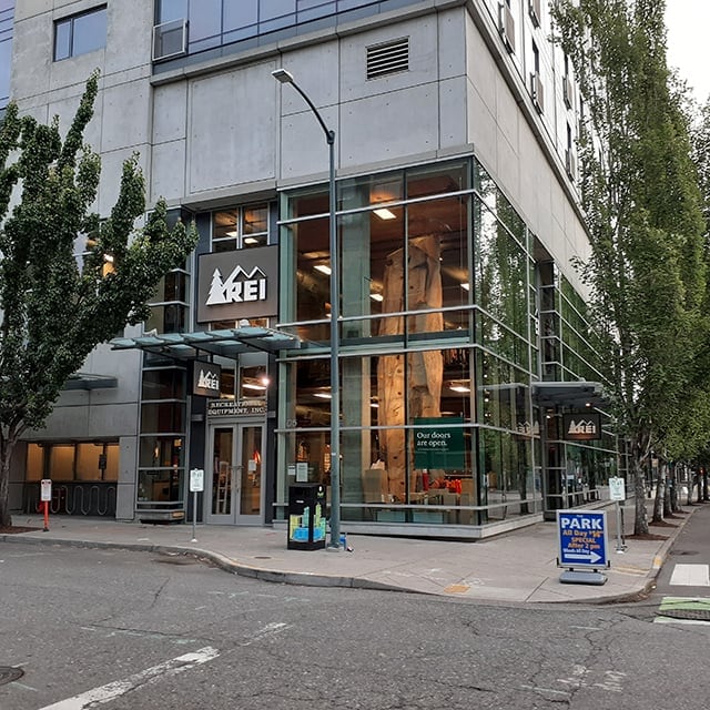 Workers boarding up the REI Flagship store in New York during the