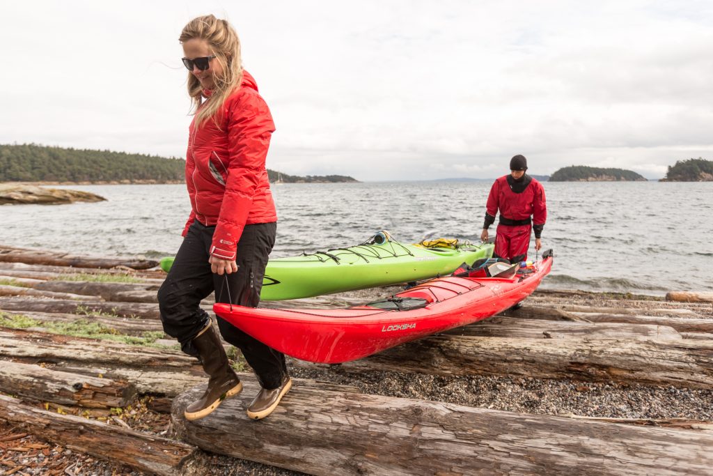 Kayakers pull in their boats