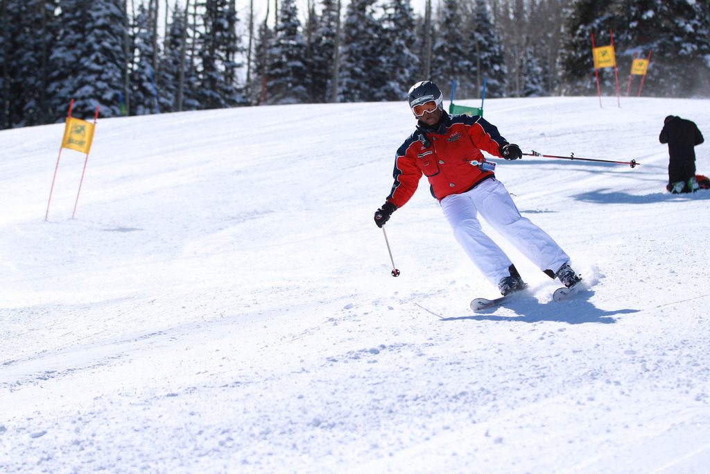 A skier from the Boston Ski Party slides down the snow in Massachusetts.