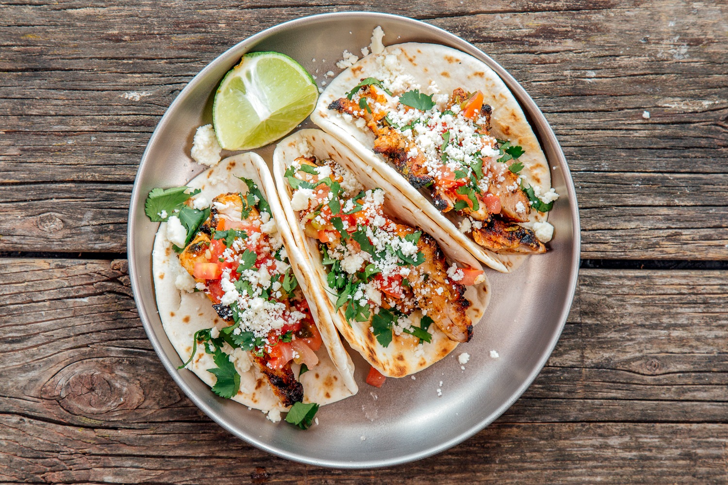 Plated cilantro lime chicken tacos