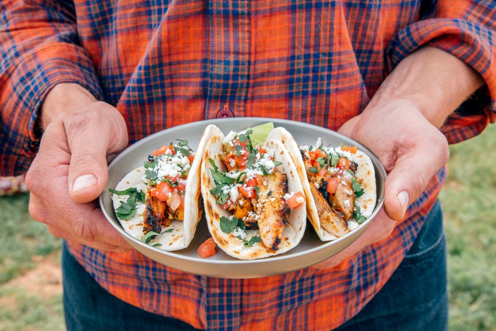 Grilled cilantro and lime chicken tacos plated and ready to serve