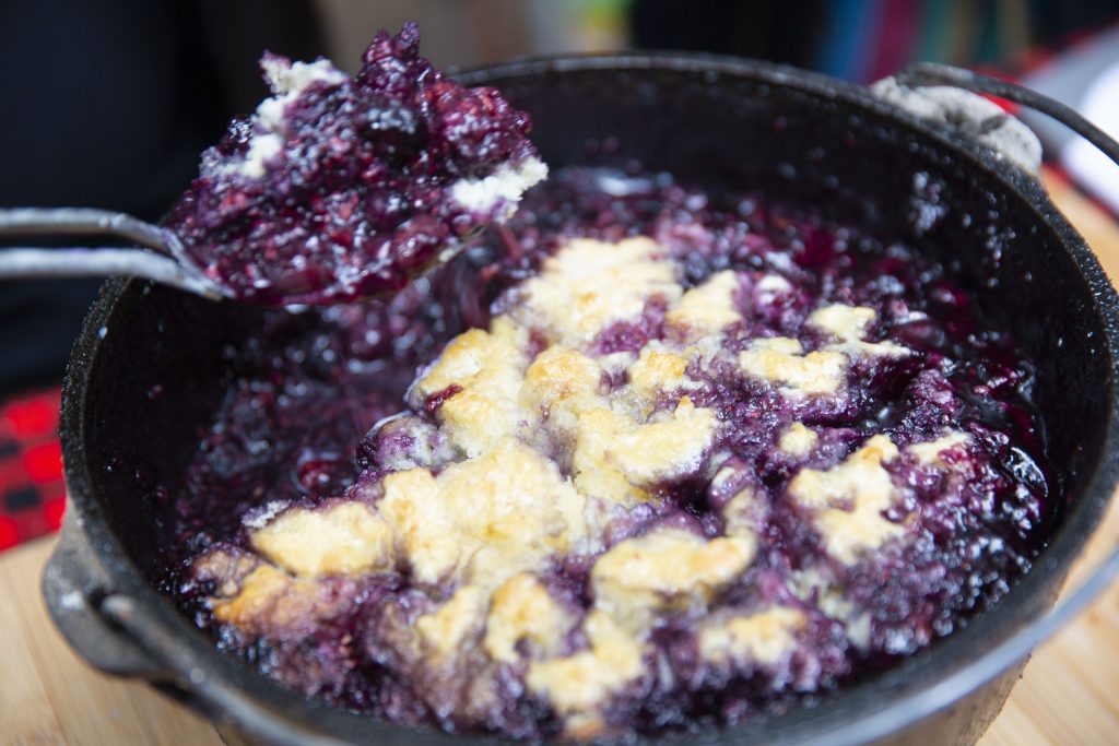 Berry cobbler is a dutch oven, ready to eat