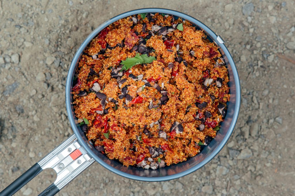 Backpacking burrito bowl in pot after cooked