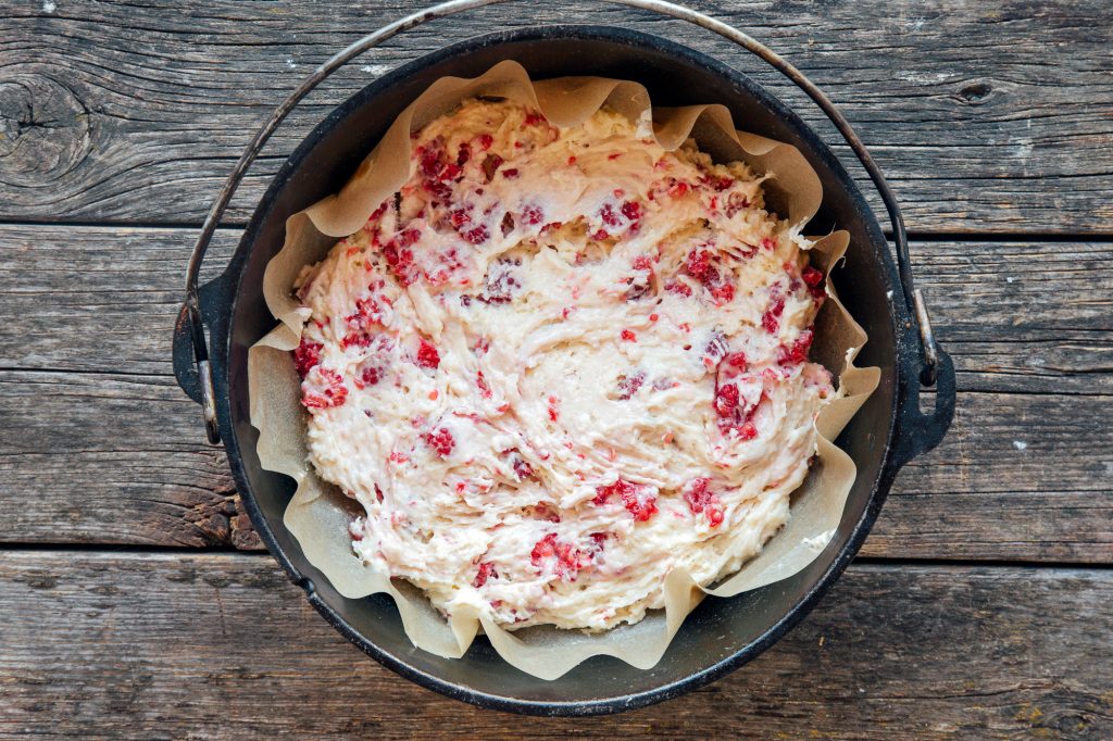 Raspberry cake dough in dutch oven