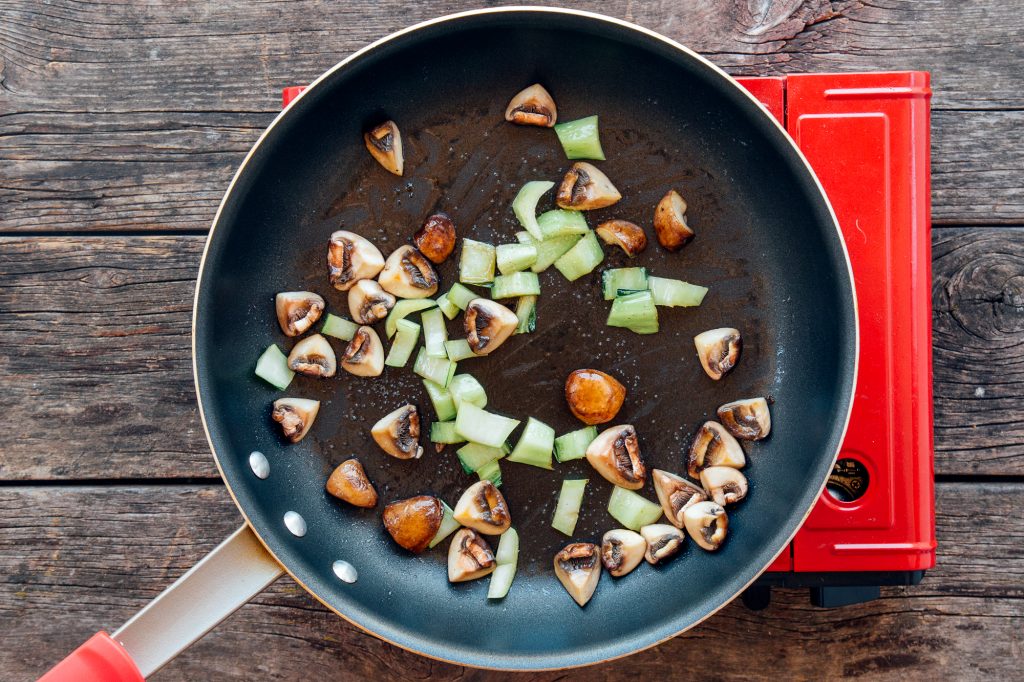 Veggies sauteeing in pan