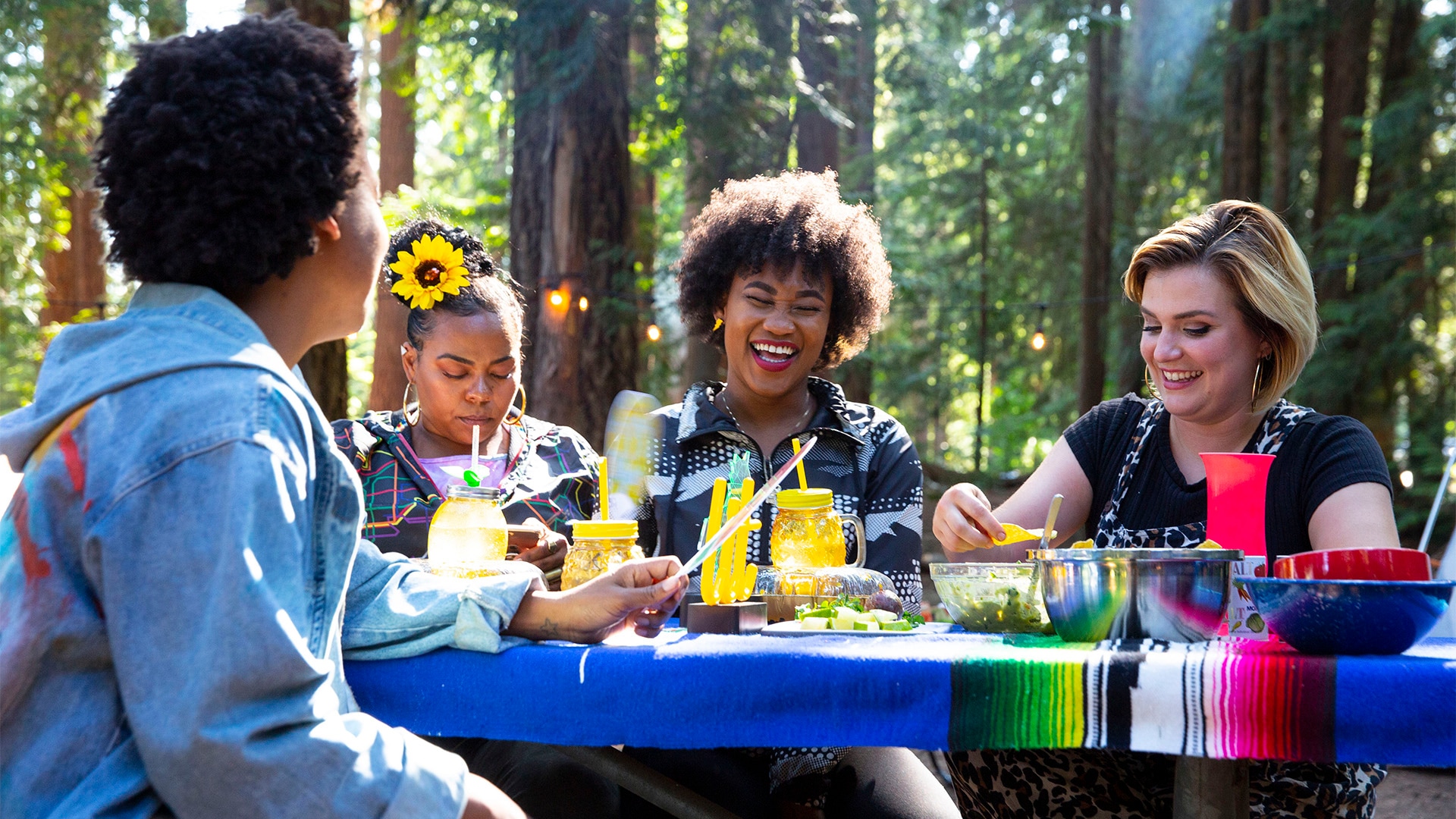 Campworthy hosts and guests eating vegetarian pozole