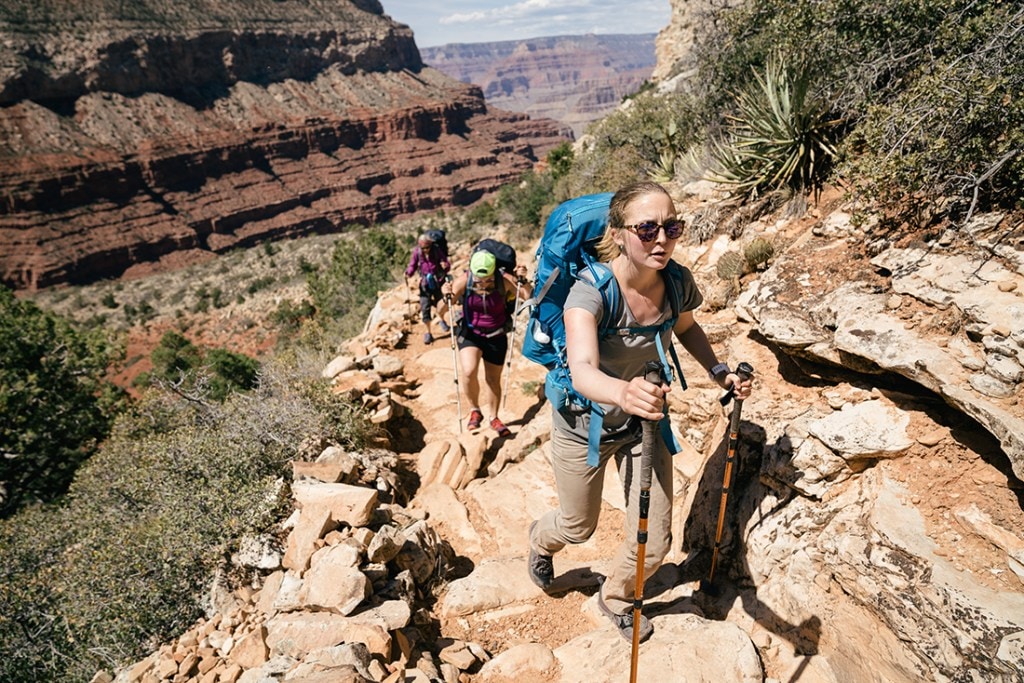 Hikers ascend a trail in Grand Canyon National Park.