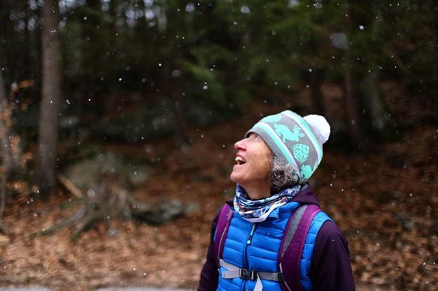 Smiling hiker in snow