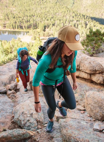 two women on an uphill trail