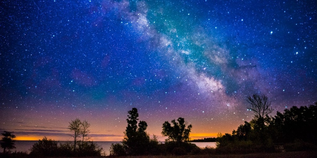 A star field shimmers over Lake Michigan at Newport State Park. 