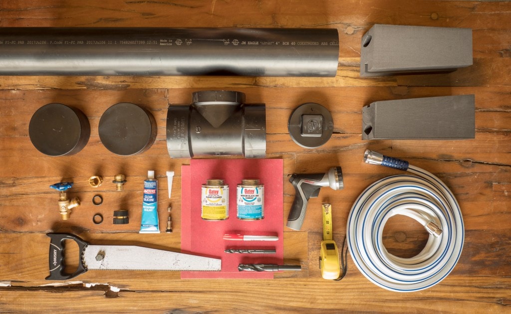 Materials to make a DIY camp shower