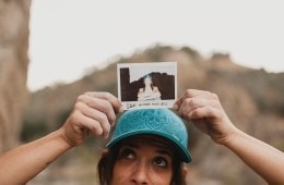 Asia holding a polariod