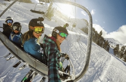 Kids on a chairlift at a ski resort