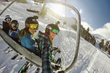 Kids on a chairlift at a ski resort