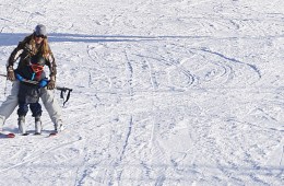Anna and her son skiing