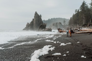 hikers on a beach