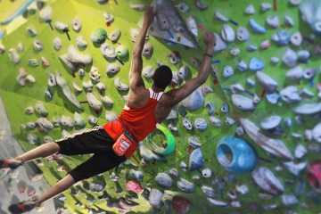 Kai Lightner climbing