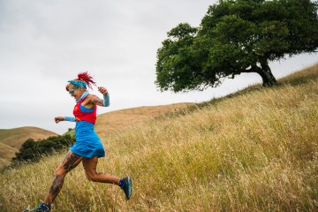 Catra Corbett running downhill.