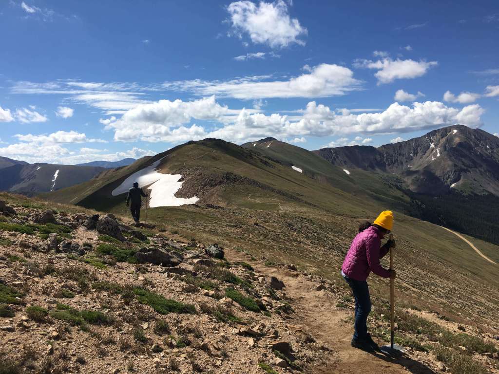 A volunteer works on a section of the Continental Divide Trail near Jones Pass in Colorado.