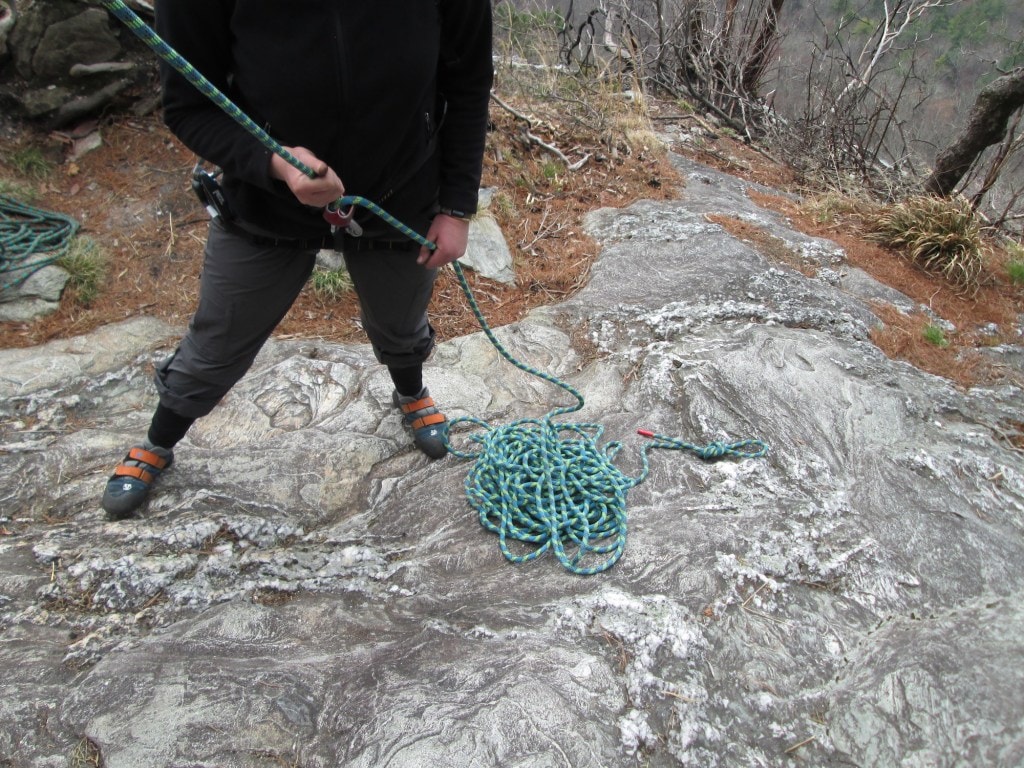 Get in the habit of typing a stopper knot in the belayer’s end of the rope befeore any single-pitch climb. (Either a double overhand or a figure 8 on a bight is simple and effective.) A stopper knot prevents the end of the rope from slipping through the belay device in case the rope is too short for lowering a climber from an anchor. 