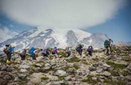 Hikers on a snowcapped volcano