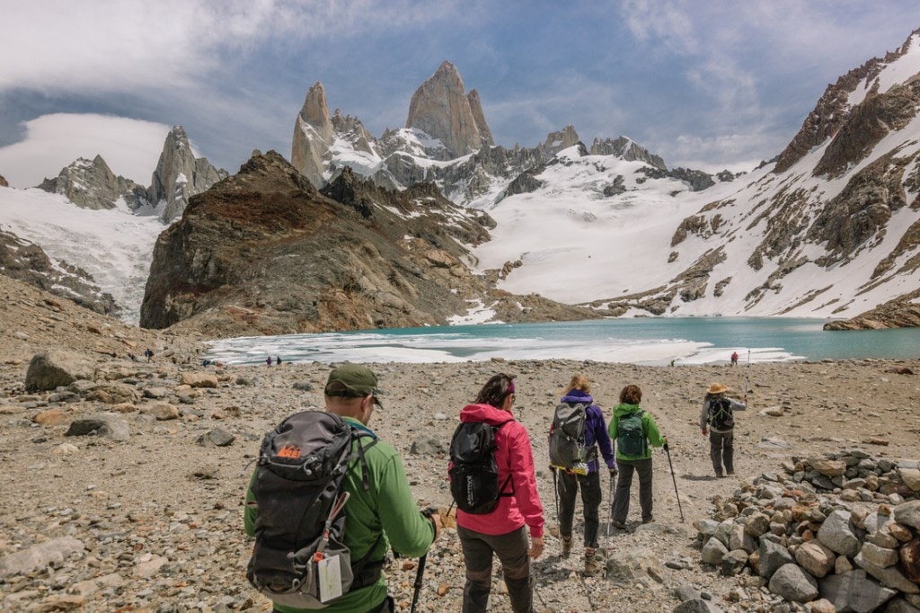 Hikers trek in Torres del Paine National Park. 