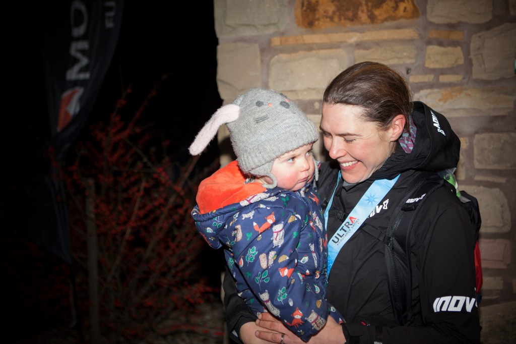 Jasmin greets her 14-month-old daughter Rowan at the finish line on the evening of January 16. 