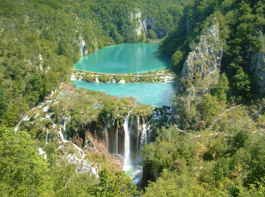 Terraced lakes bound in Limestone dot the enchanted realm of Plitviče Lakes National Park.