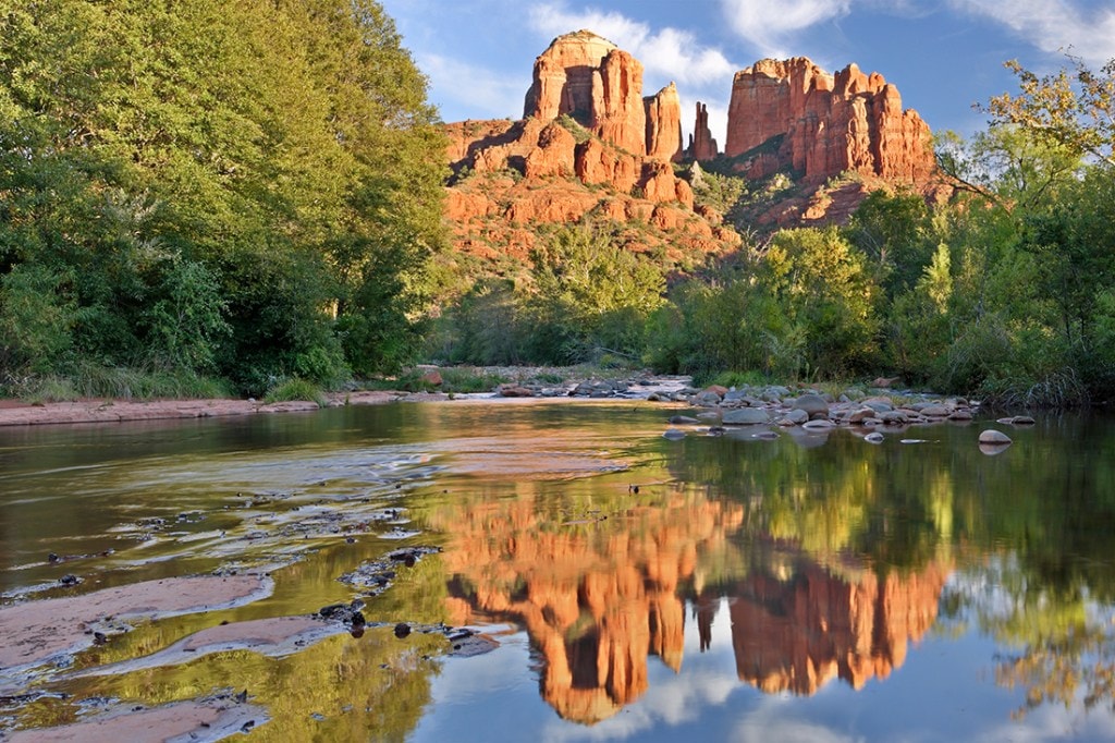 Cathedral Rocks and their reflection in Oak Creek near Sedona, Arizona).