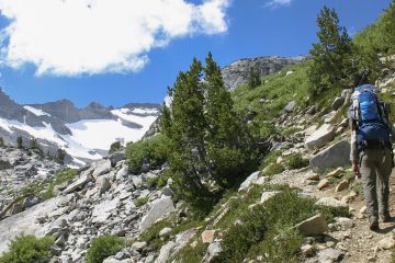 A backpacker hikes into the High Sierra backcountry in Sequoia National Park.