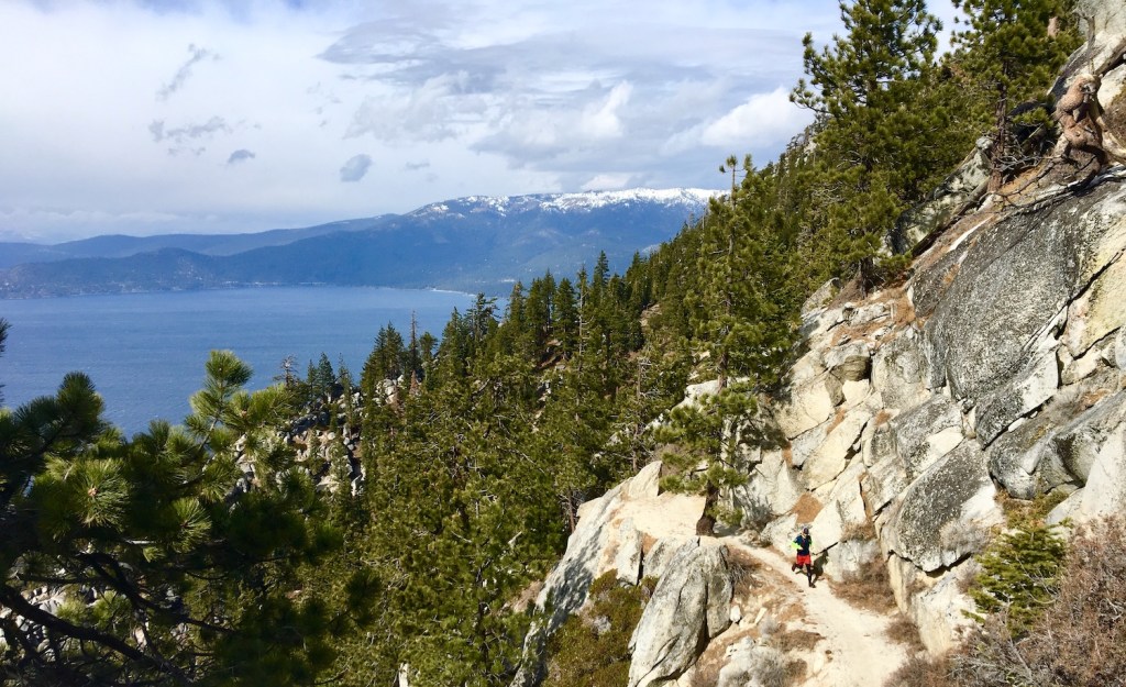 Chris Cloyd on a run on a scenic trail above Lake Tahoe.